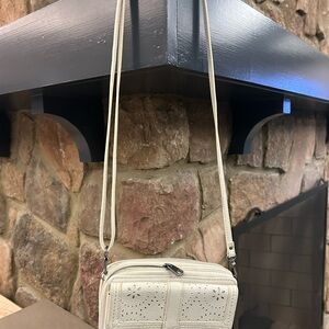 the sak Cream Laser-Cut Crossbody Bag with Adjustable Strap. Very handy bag!